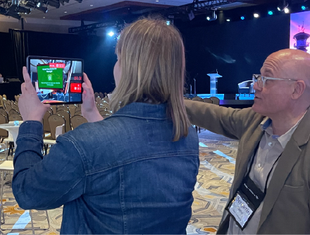 Participant interacting with conference game