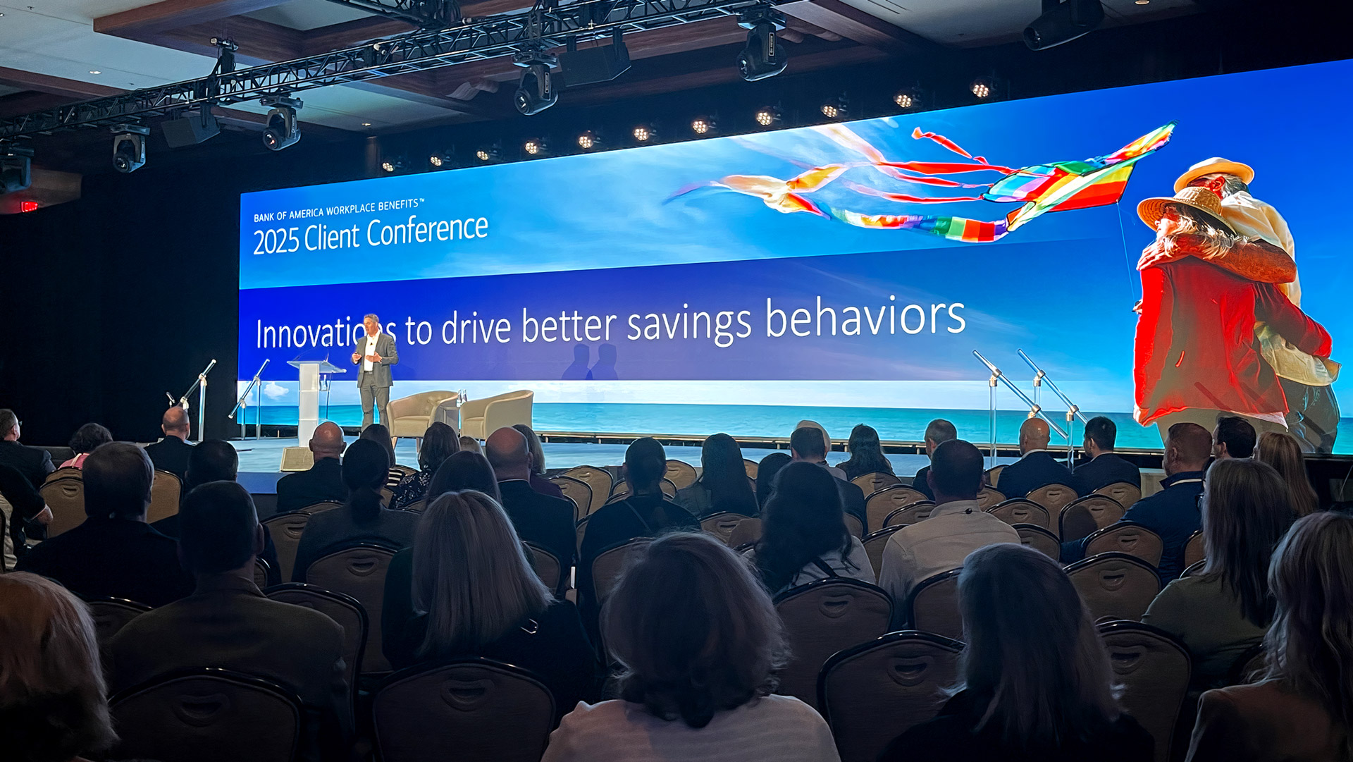 Conference PowerPoint presentation by speaker on stage