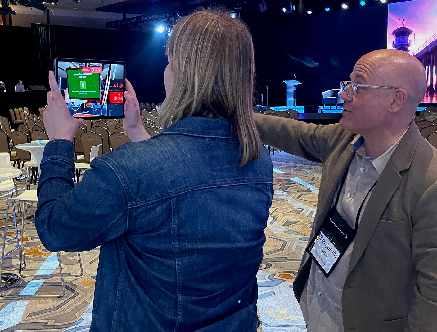 Participant interacting with conference game